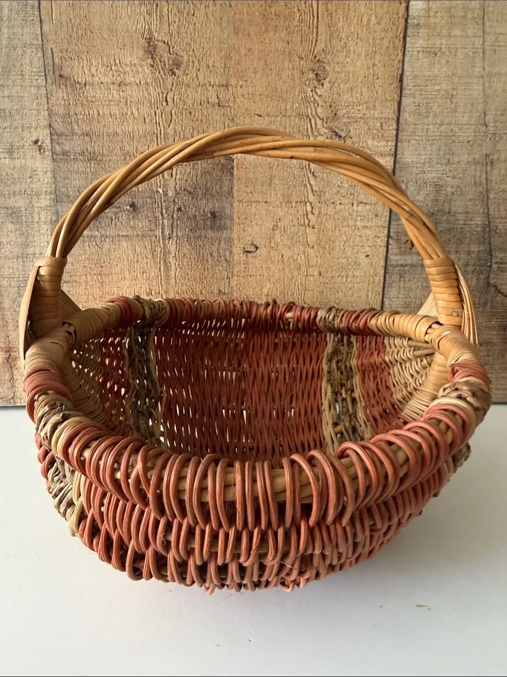 Vintage Primitive Woven Buttocks Basket with God’s Eye in Natural and Terracotta